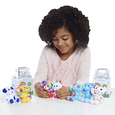 child playing with mini plush